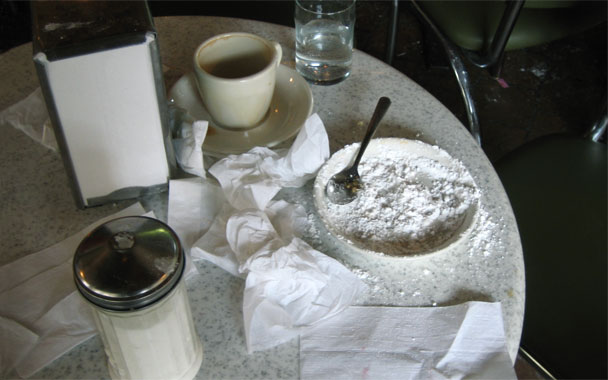 powdered sugar from beignet at Cafe du Monde