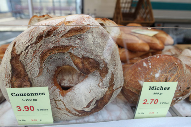 <strong>Bread</strong><br> Rustic loaves like the <em>couronne,</em> or crown, and <em>miche</em> compete with the ever-popular baguette at the farmers' market. On this wet day, the baguette won my affection. It was easier than a crown to carry home in the rain.