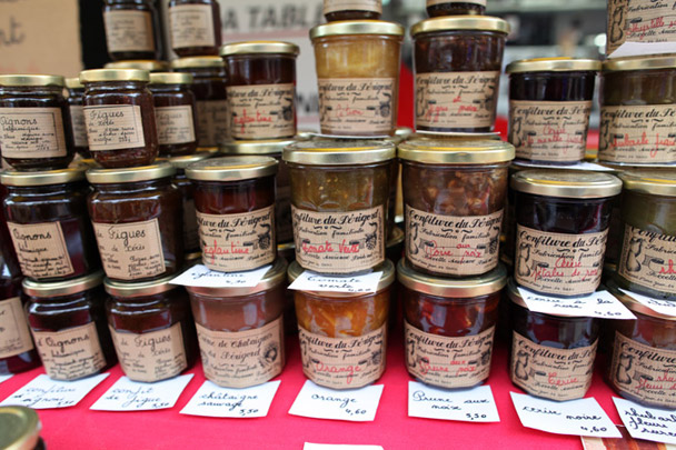 <strong>Confitures</strong> <br>Oranges, cherries, and prunes with walnuts make for sweet spreads for a baguette. The French preserves available in Le Bugue seem to mirror every color of the rainbow. Time allowed for the sampling of only one: green tomato preserves. I expected a savory flavor, but instead got a wallop of sweet citrus. The jam maker definitely preferred to treat the tomato as a fruit, and I happily lapped this confiture up, slathering it on hunks of baguette with sweet butter.