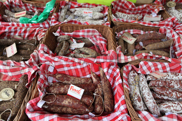 <strong>Sausages</strong><br> The way to tell a really great sausage is to slice it in half and watch as it sweats; the more it perspires, the fattier and more delicious it's bound to be. These short sausages didn't disappoint, sweating like liars under oath. About five inches long, these <em>saucissons</em> are made with pork and more exotic meats like donkey (<em>l'ane</em> in French). This producer smokes some and flavors others with pepper, herbs, and cheese. To store them at home, we hung them on a key hook in the kitchen.
