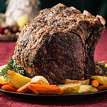 Herb-Crusted Beef Rib Roast with Potatoes, Carrots, and Pinot Noir Jus 