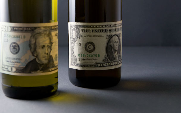 money on wine bottles